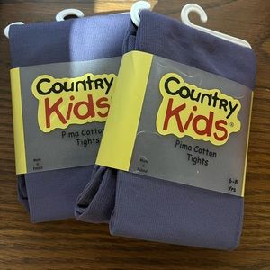 Girls plum tights - 6-8 yrs